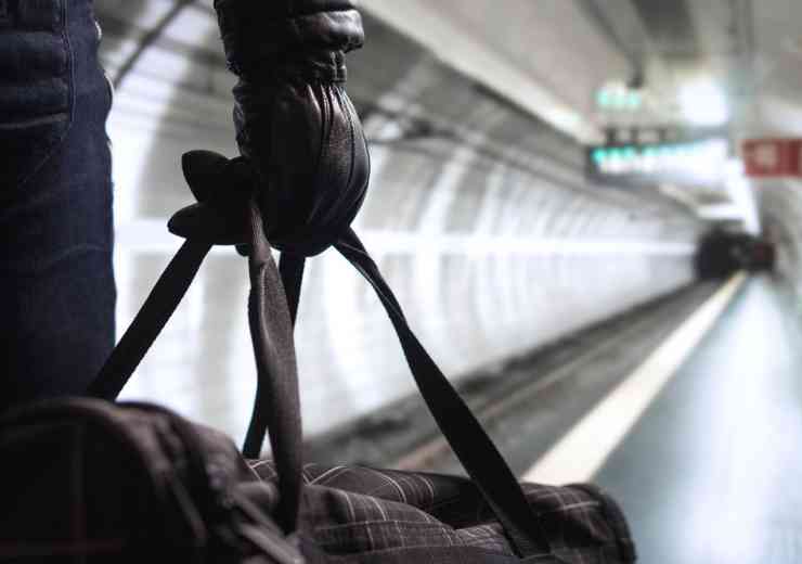 Criminal holding bag