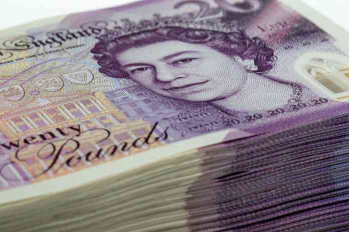 Stack of British twenty pound notes Stack of British twenty pound notes