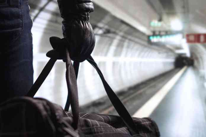 Criminal holding bag