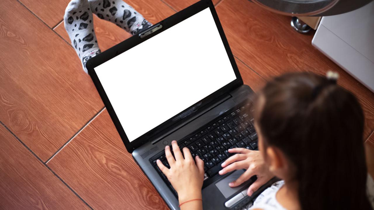 Kid on laptop